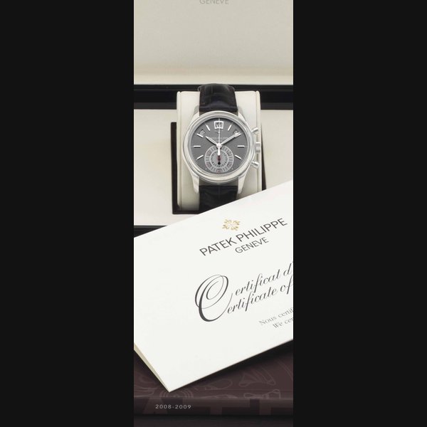 Patek Philippe. A Fine Platinum Automatic Annual Calendar Flyback Chronograph Wristwatch with Power Reserve and Day and Night Indicator SIGNED PATEK PHILIPPE, GENEVE, REF. 5960, MOVEMENT NO. 3'503'302, CASE NO. 4'450'981, CIRCA 2008
