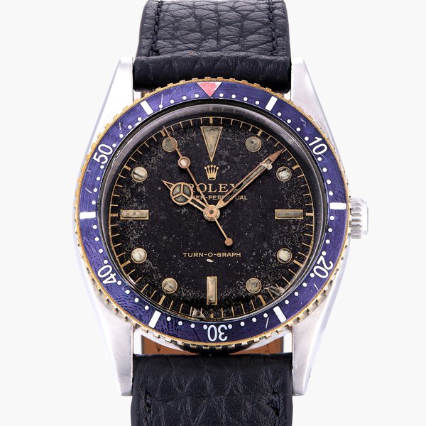 Rolex Turn-O-Graph 'Exclamation Dial', Reference 6202  | A stainless steel wristwatch with gilt dial | Circa 1953