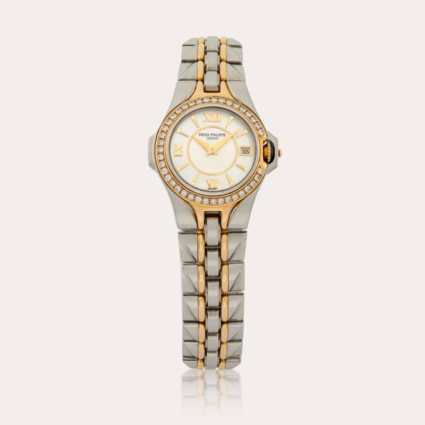 Patek Philippe Reference 4891/11 | A diamond-set yellow gold and stainless steel wristwatch with date and bracelet | Circa 2000