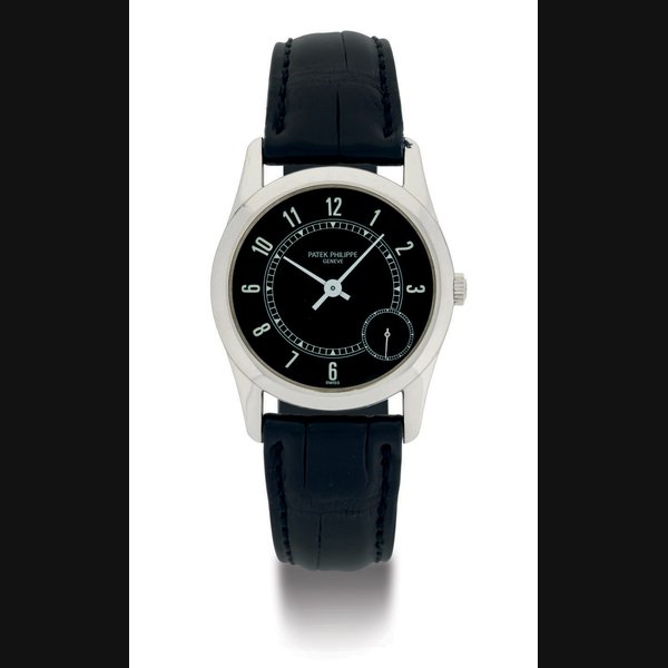 PATEK PHILIPPE. A LIMITED EDITION 18K WHITE GOLD AUTOMATIC WRISTWATCH WITH BLACK DIAL AND ECCENTRIC SUBSIDIARY SECONDS SIGNED PATEK PHILIPPE, GENEVE, MOVEMENT NO. 800460, CASE NO. 2934181, REF. 5000, MANUFACTURED IN 1992