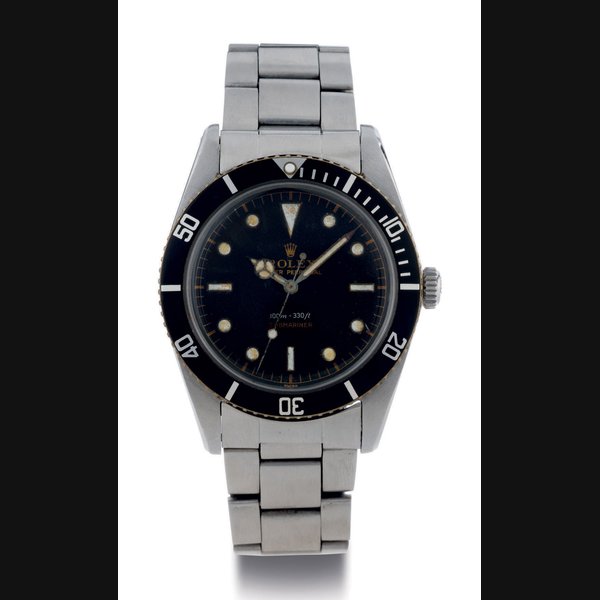 ROLEX. A RARE STAINLESS STEEL AUTOMATIC WRISTWATCH WITH CENTER SECONDS AND BRACELET SIGNED ROLEX, SUBMARINER, 100M=330FT, JAMES BOND MODEL, CASE NO. 469989, REF. 5508, CIRCA 1958