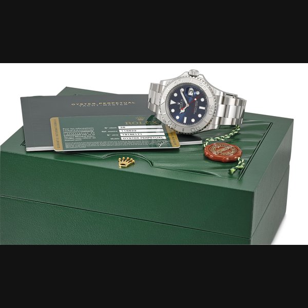 ROLEX. A STAINLESS STEEL AUTOMATIC WRISTWATCH WITH DATE, BRACELET, PLATINUM BEZEL INSERT, BLUE DIAL, ORIGINAL GUARANTEE AND BOX SIGNED ROLEX, OYSTER PERPETUAL DATE, YACHT-MASTER, REF. 116622, CASE NO. 1916E171, CIRCA 2013