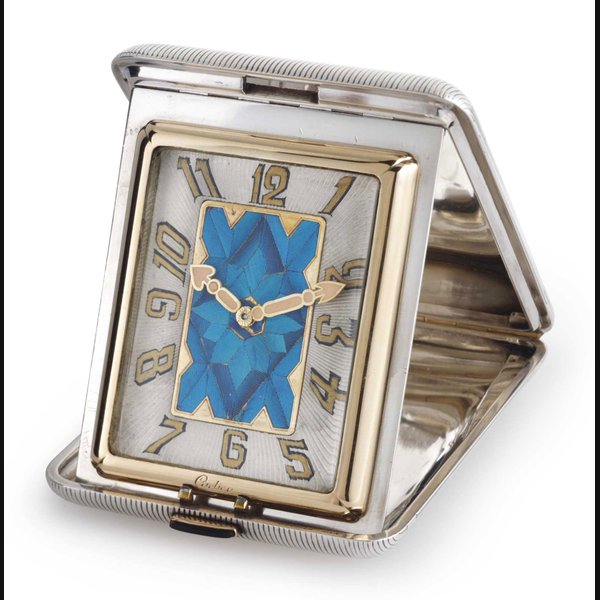 CARTIER. A SILVER, 18K GOLD AND PEACOCK FEATHER FOLDING TRAVEL CLOCK SIGNED CARTIER, PARIS, MOVEMENT SIGNED MAJESTIC WATCH CO., CASE NOS. NO. 1464 AND 2741, CIRCA 1925