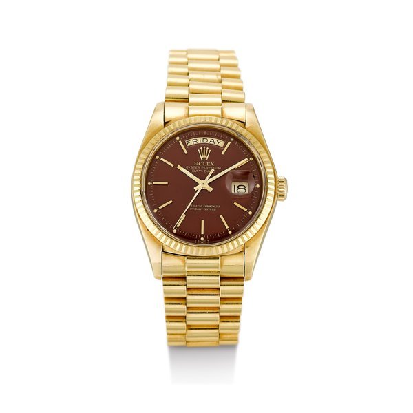 Rolex Day-Date, Reference 1803 | A pink gold wristwatch with day, date, brown tobacco lacquered "Stella" dial and bracelet, Circa 1978 | 勞力士 Day-Date 型號1803 | 粉紅金鏈帶腕錶，備日期、星期顯示及啡色漆製"Stella"錶盤，約1978年製 · 1803