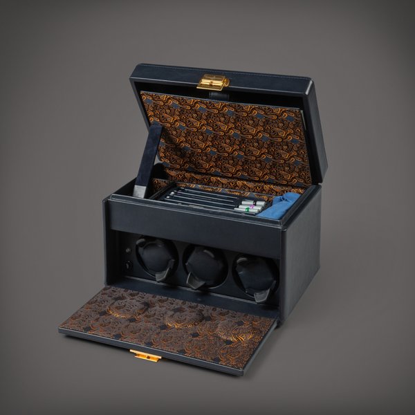 Ulysse Nardin Ecrin rotatif en cuir pour 3 montres avec surboîte et outils horlogers |  Leather winding case for 3 watches with presentation case and watchmaking tools    Vers 1990 |  Circa 1990
