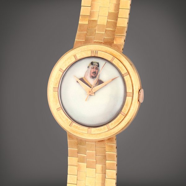 Universal Genève Reference 106525-3A | A yellow gold bracelet watch with enamel dial depicting His Highness King Saud Bin Abdul Aziz | Circa 1955 · 106525-3A