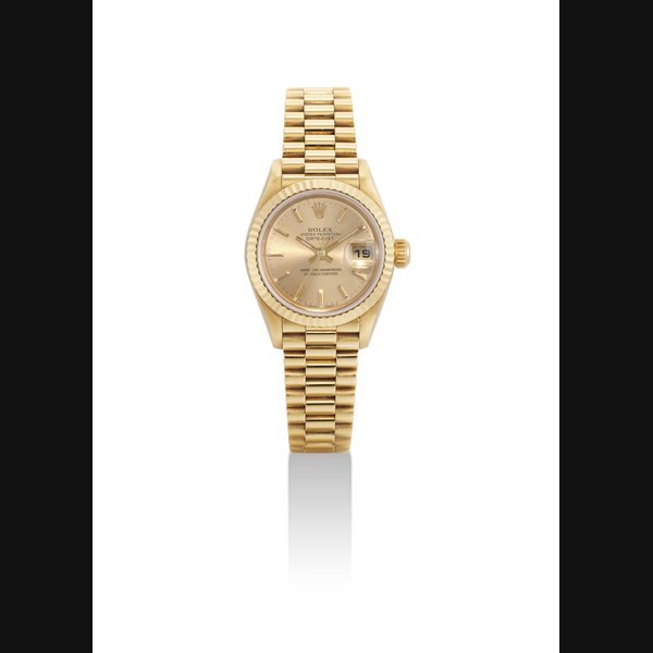 Rolex ROLEX. A LADY'S 18K GOLD AUTOMATIC WRISTWATCH WITH SWEEP CENTRE SECONDS, DATE AND BRACELET SIGNED ROLEX, OYSTER PERPETUAL, DATEJUST MODEL, REF. 79178, CASE NO. U313645, CIRCA 1997