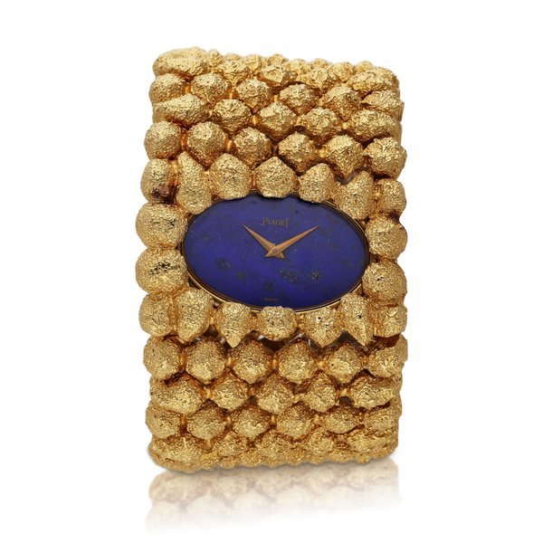 Piaget Reference 9850 D79 | A yellow gold bracelet watch with lapis lazuli dial, Circa 1970 · 9850