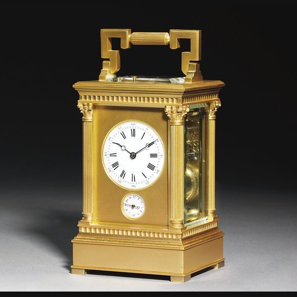  A French gilt-brass striking and repeating eight day carriage clock with musical alarm CIRCA 1880