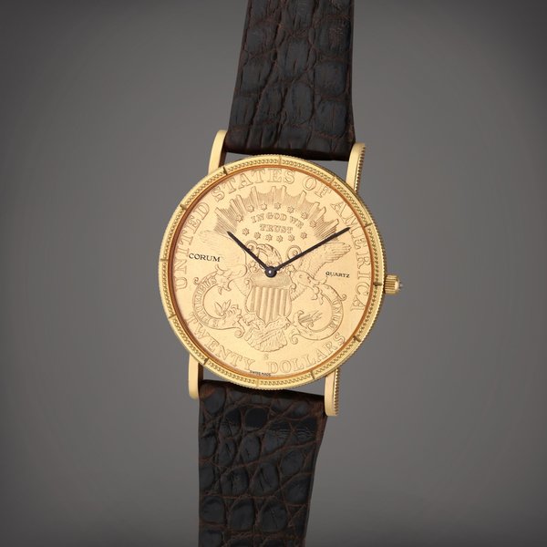 Corum Reference 373985 | A yellow gold wristwatch with coin front and back, Circa 1980