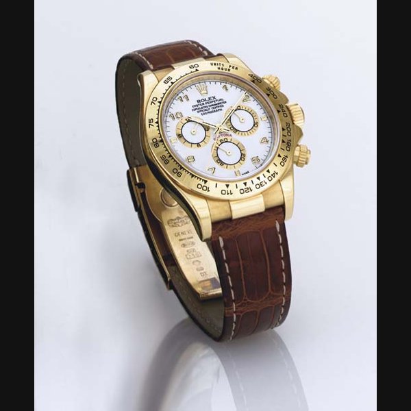 ROLEX. AN 18K GOLD AUTOMATIC CHRONOGRAPH WRISTWATCH SIGNED ROLEX, OYSTER PERPETUAL, "COSMOGRAPH DAYTONA", CASE NO. Y172947, REF. 116518, CIRCA 2000