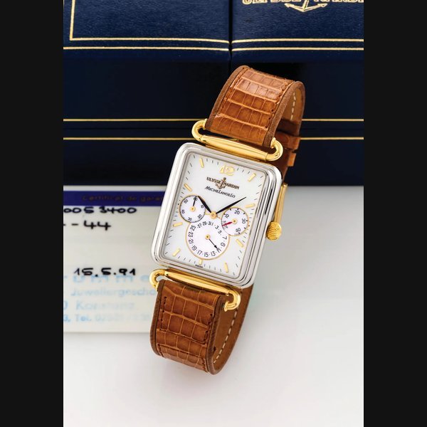 Ulysse Nardin ULYSSE NARDIN - MICHELANGELO BICOLOR Ulysse Nardin, "Michelangelo Power Reserve", No. 1708, Ref. 174-44. Made circa 1990, sold on May 15, 1991. Fine, rectangular, self-winding, water-resistant, stainless steel and yellow gold wristwatch with 40 hours power reserve and date. Accompanied by an Ulysse Nardin box and certificate. | Important Modern & Vintage Timepieces | Geneve, 11 May 2014 · 174-44