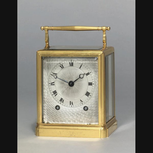  A French brass striking eight day carriage clock PAUL GARNIER, PARIS. CIRCA 1835