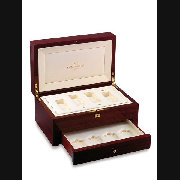 PATEK PHILIPPE. A WOODEN PRESENTATION BOX FOR FOUR WATCHES, ORIGINALLY SOLD WITH THE PREVIOUS SET OF REFERENCE 3970 A WOODEN PRESENTATION BOX FOR FOUR WATCHES WITH OUTER PACKAGING