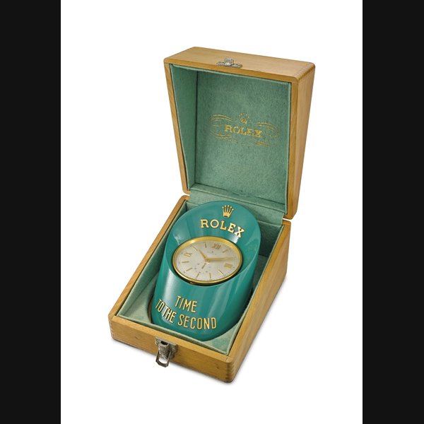Rolex. A rare and unusual gilt brass and painted hoof-shaped display desk clock with stop feature and original box Signed Rolex, Time to the Second, movement no. 1224, circa 1960