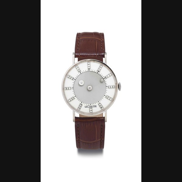  VACHERON CONSTANTIN AND LECOULTRE. A 14K GOLD AND DIAMOND MYSTERY WRISTWATCH SIGNED VACHERON CONSTANTIN-LECOULTRE, MOVEMENT NO. 1042642, CASE NO. 93194, CIRCA 1960