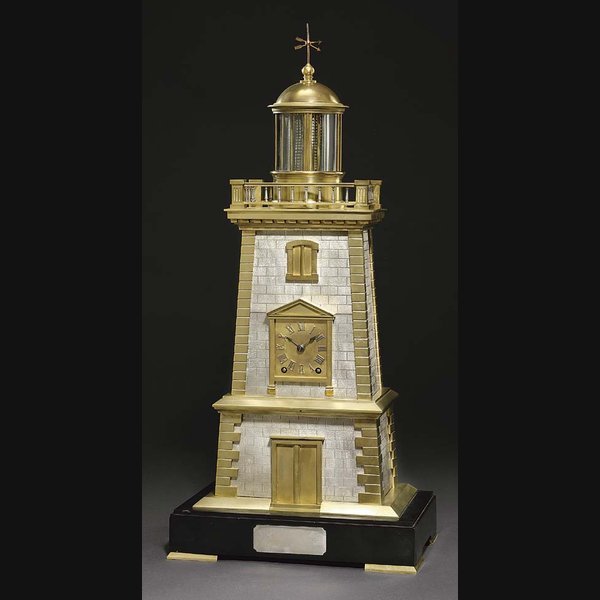 Lighthouse A French brass and silvered brass and marmo nero Belgio eight day striking novelty clock with oscillating light GUILMET & VINCENTI, PARIS. CIRCA 1890