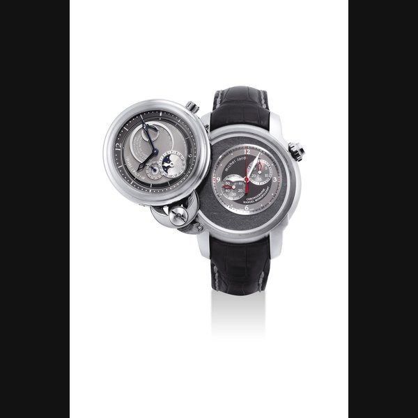 MICHEL JORDI. A RARE AND UNUSUAL 18K WHITE GOLD LIMITED EDITION TWIN CASE TWO TIME ZONES SINGLE BUTTON CHRONOGRAPH WRISTWATCH WITH TWO INDEPENDENT MOVEMENTS, POWER RESERVE, DATE, MOON PHASES AND SLATE ROCK DIAL SIGNED MICHEL JORDI, GRAND CHRONOGRAPHE DOUBLE FUSEAUX HORAIRE RÉSERVE DE MARCHE, HERITAGE & AUTHENTIC VALUES, CHRONOGRAPHE MANUEL MONOPULSANT, NO. 71/99, "TWIN" HERITAGE MODEL, CIRCA 2005