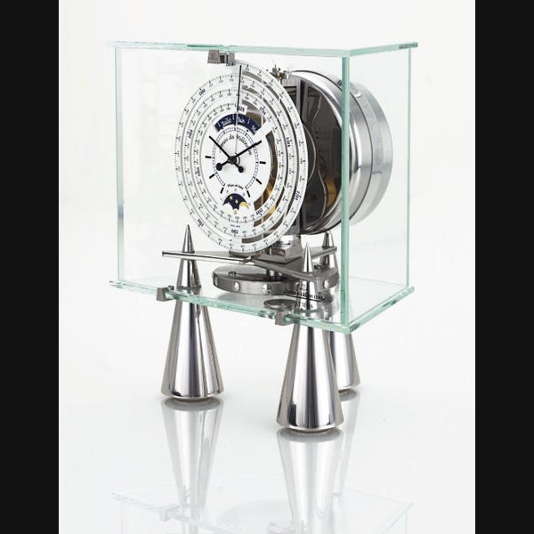 Jaeger-Lecoultre JAEGER-LECOULTRE. A STAINLESS STEEL AND GLASS BAROMETRIC-DRIVEN CLOCK WITH 1000 YEAR CALENDAR AND PHASES OF THE MOON SIGNED JAEGER-LECOULTRE, ATMOS DU MILLÉNAIRE, "ATLANTIS", CIRCA 2000