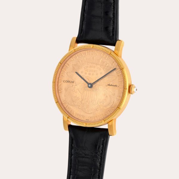 Corum 20$ Coin, Reference 082.355-56 | A yellow gold wristwatch | Circa 2015 · 082.355-56