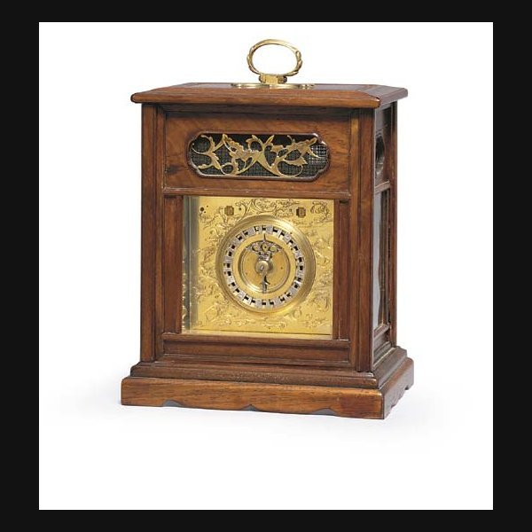 A Japanese padouk wood striking small table clock with calendar SECOND HALF 19TH CENTURY