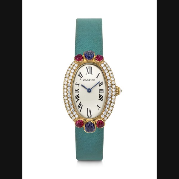 CARTIER. A RARE AND ELEGANT 18K GOLD, DIAMOND, RUBY AND BLUE SAPPHIRE-SET QUARTZ OVAL-SHAPED WRISTWATCH BAIGNOIRE ‘TUTTI FRUTTI’ MODEL, REF. 1950-1, CASE NO. C31227, CIRCA 1990s