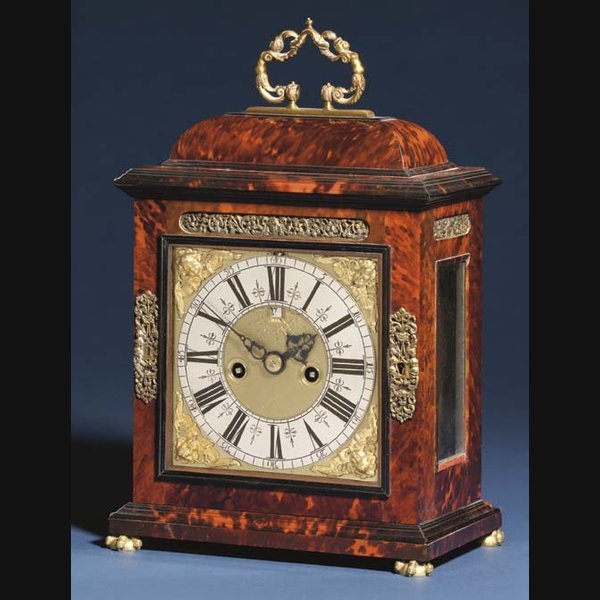 A William and Mary red tortoiseshell and brass-mounted striking table clock with pull quarter repeat LOUIS BRULEFER, LONDON.