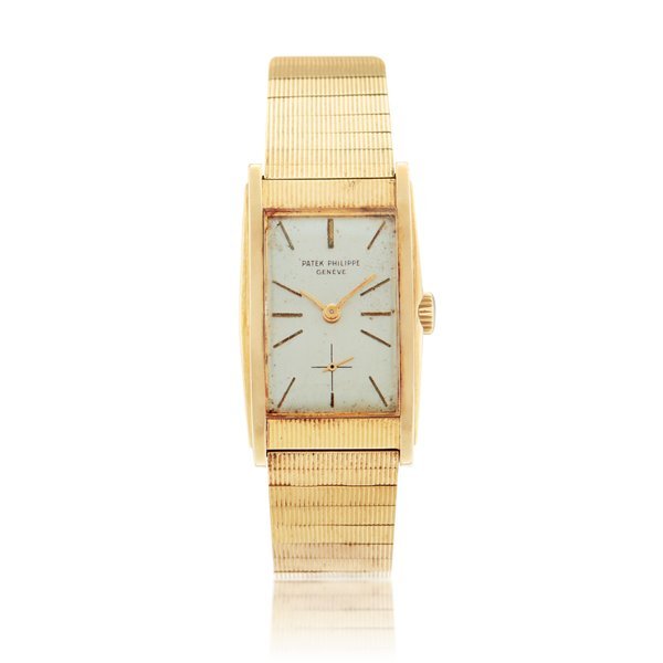 Patek Philippe Reference 2580/1 | A yellow gold rectangular wristwatch with bracelet, Circa 1955 · 2580/1