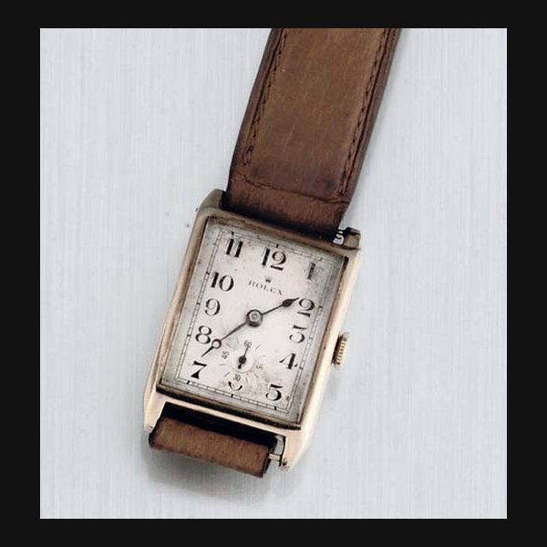 Rolex Rolex. A 9ct Gold curved Back Rectangular Wristwatch SIGNED ROLEX, CASE NO 34-57321, GLASGOW IMPORT MARK FOR 1928