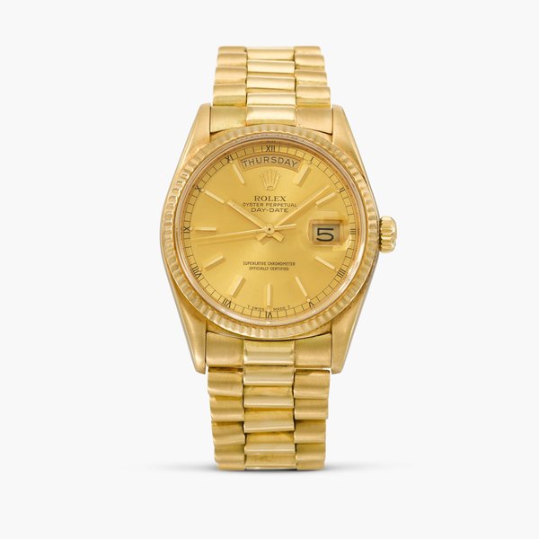 Rolex Day-Date, Reference 18038 | A yellow gold wristwatch with day, date and bracelet | Circa 1984 · 18038