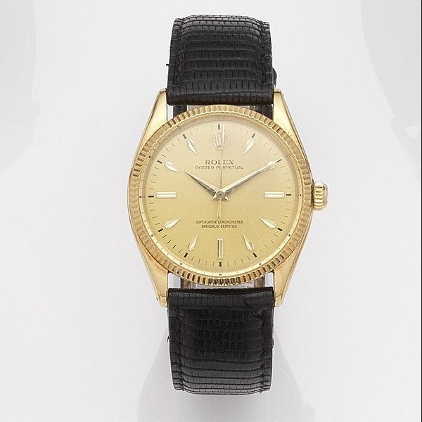 Rolex Rolex. An 18k gold automatic wristwatch Oyster Perpetual, Ref:6567, Serial No.319***, Movement No.N725***, Circa 1957 · 6567