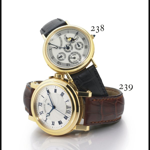 BREGUET. A FINE OVERSIZED 18K GOLD AUTOMATIC WRISTWATCH WITH CENTER SECOND AND DATE SIGNED BREGUET, "MARINE BIG DATE", NO. 650 W, REF. 5817, CIRCA 2006