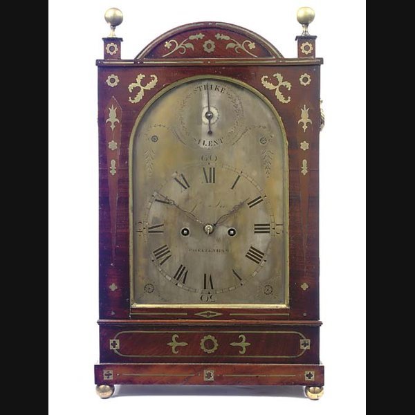 A Regency mahogany and brass inlaid striking table clock, circa 1820