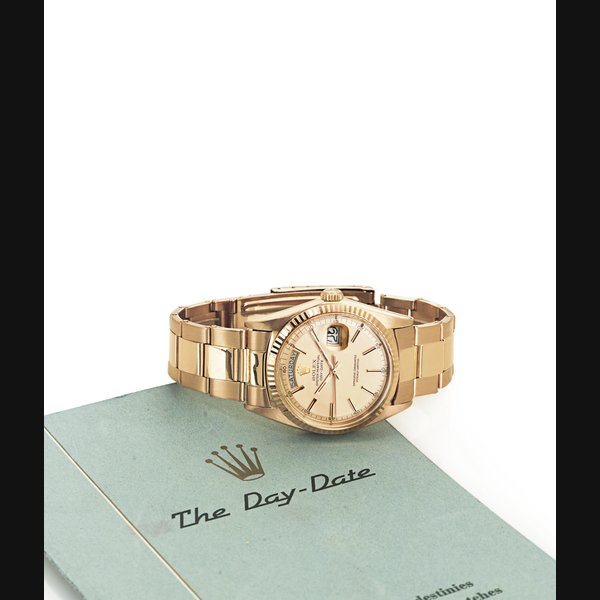 ROLEX. AN 18K PINK GOLD AUTOMATIC WRISTWATCH WITH DAY, DATE AND BRACELET SIGNED ROLEX OYSTER PERPETUAL, DAY-DATE, MOVEMENT NO. DD421923, CASE NO. 2097910, REF. 1803, CIRCA 1975