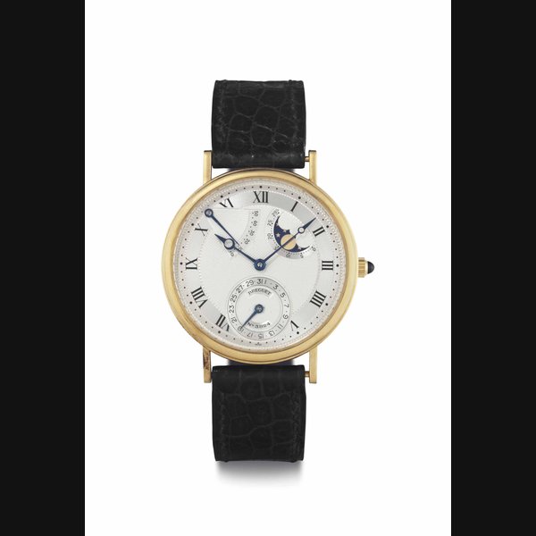 Breguet. An 18k Gold Automatic Wristwatch With Date, Power Reserve, and Moon Phases SIGNED BREGUET, NO. 3924, CIRCA 1995