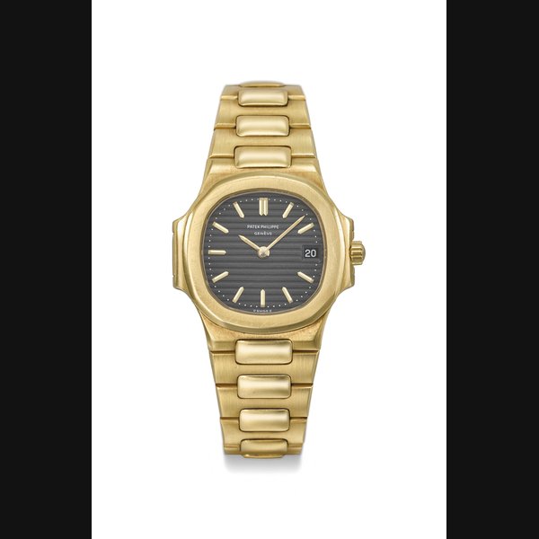 PATEK PHILIPPE. A FINE 18K GOLD LADY’S WRISTWATCH WITH SWEEP CENTRE SECONDS AND BRACELET Signed Patek Philippe, Genève, Nautilus model, réf. 4700-1, movement no. 1'522'315, case no. 553'543, manufactured in 1981