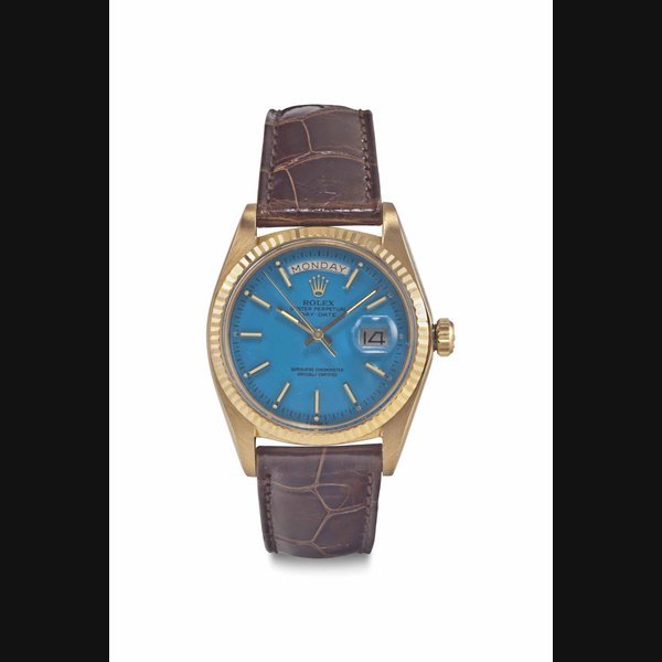 Rolex Rolex. An Attractive 18k Pink Gold Automatic Calendar Wristwatch with Turquoise Blue Lacquered Dial SIGNED ROLEX, OYSTER PERPETUAL, DAY-DATE, REF. 1803, CASE NO. 3'599'037, CIRCA 1975