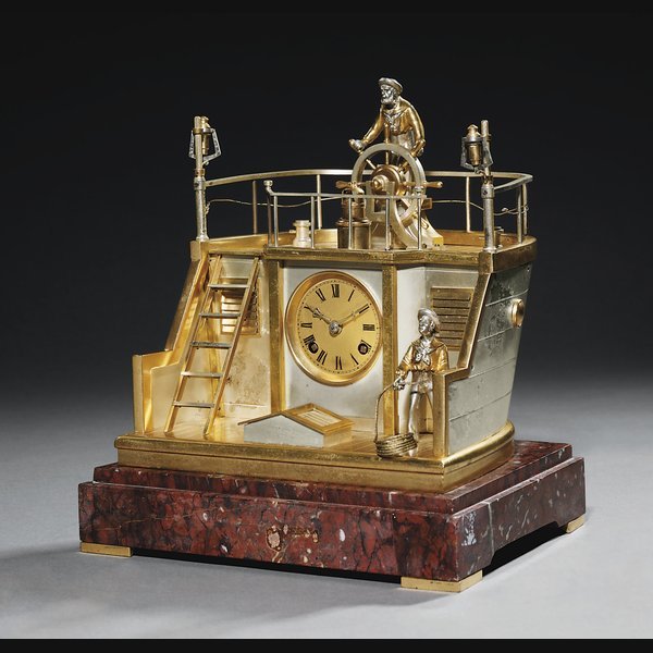  A French gilt and silvered brass and rouge griotte marble striking eight day novelty clock in the form of a quarter deck with rocking mariner GUILMET, PARIS. CIRCA 1890