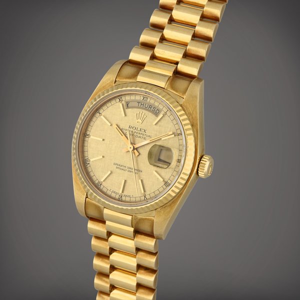Rolex Day-Date, Reference 18038 | A yellow gold wristwatch with day, date and bracelet | Circa 1982 · 18038