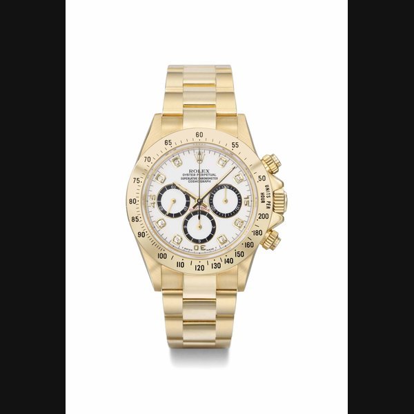 Rolex Rolex. A rare and attractive 18K gold automatic chronograph wristwatch with diamond-set "four-liner porcelain" dial, bracelet and original guarantee and box SIGNED ROLEX, OYSTER PERPETUAL, SUPERLATIVE CHRONOMETER, COSMOGRAPH, DAYTONA, REF. 16528, CASE NO. R985691, MANUFACTURED IN 1988