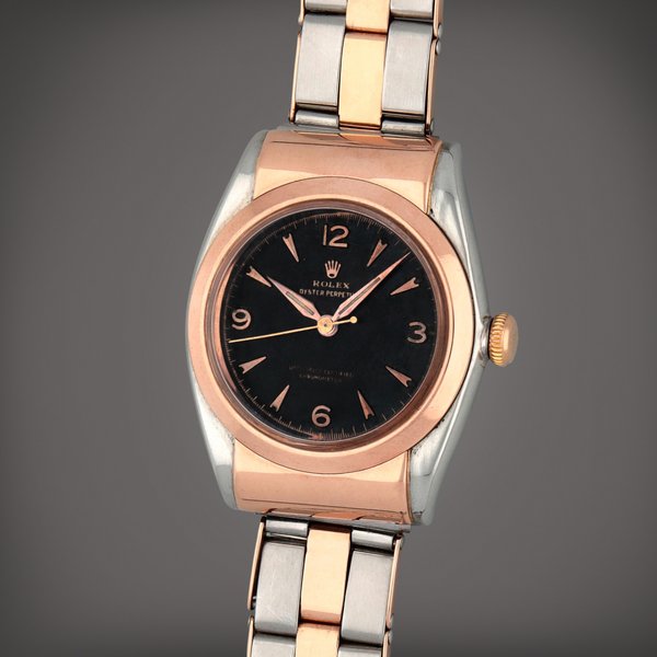 Rolex 'Bubble back', Reference 3065 | A stainless steel and pink gold wristwatch | Circa 1950