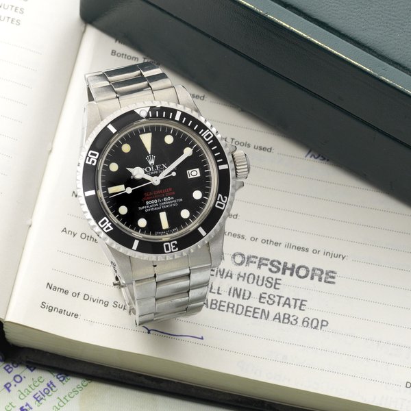 Rolex. A rare stainless steel automatic calendar bracelet watch 'Double Red' Sea-Dweller, Ref:1665, Serial No.520****, Movement No.D41****, Sold 29th October 1979