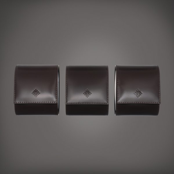 Patek Philippe A set of three leather travelling pouches, Circa 2020 | 百達翡麗 | 一套三件皮製旅行袋子，約2020年製