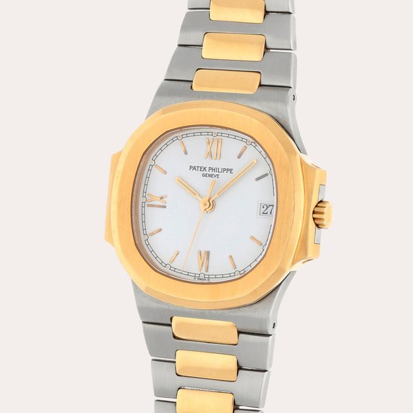 Patek Philippe Nautilus, Reference 3800/1 | A stainless steel and yellow gold wristwatch with date and bracelet | Made in 1996 · 3800/1