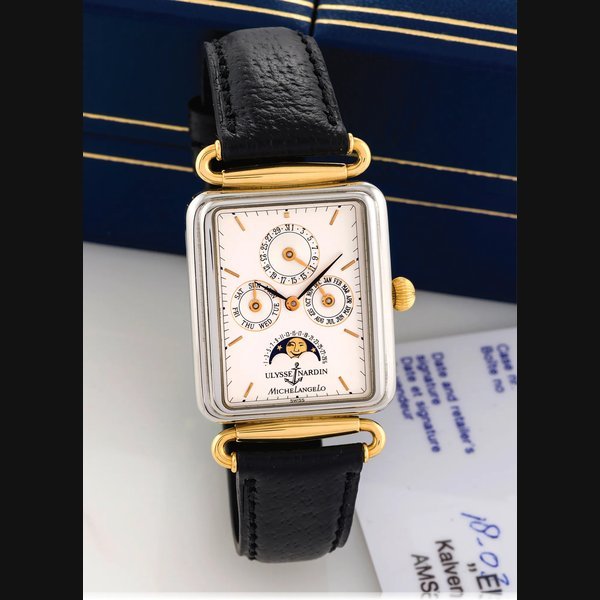 Ulysse Nardin ULYSSE NARDIN REF. 334-44 MICHELANGELO YELLOW GOLD AND STEEL Ulysse Nardin, "Michelangelo Calendar Moonphase", No. 0037, Ref. 334-44. Made circa 1990. Very fine, rectangular, water-resistant, stainless steel and yellow gold wristwatch with triple-date calendar and moon phases. Accompanied by an Ulysse Nardin box and certificate. | Important Modern & Vintage Timepieces | Hong Kong, 28th June 2014 · 334-44