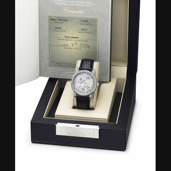 A. Lange & Söhne. A Very Fine and Rare Platinum Twin Barrel World-Time Wristwatch with Oversized Date, Day and Night Indication, Power Reserve, and Hack Feature SIGNED A. LANGE & SÖHNE, GLASHÜTTE I/SA, LANGE 1 TIME ZONE MODEL. REF. 116.025, MOVEMENT NO. 52'773, CASE NO. 164'392, CIRCA 2006