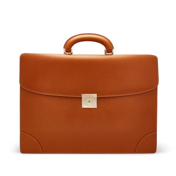 Rolex Valextra: A brown leather briefcase with gold plated hardware