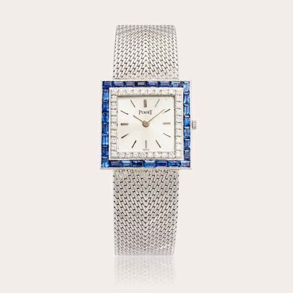 Piaget Reference 9203 B91 | A white gold, sapphire and diamond-set square shaped bracelet watch, Circa 1975