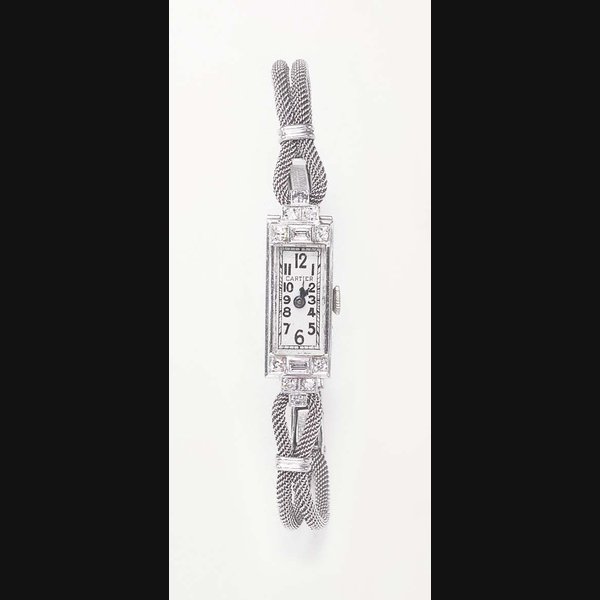 AN ART DECO DIAMOND WRISTWATCH, BY CARTIER, MOVADO