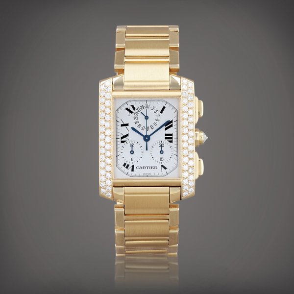 Cartier Tank française, reference 1830     Montre bracelet chronographe en or jaune et sertie de diamants avec date |  Yellow gold and diamond-set chronograph wristwatch with date and bracelet     Vers 2005 |  Circa 2005